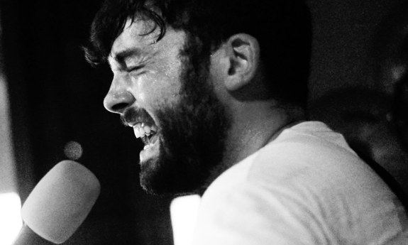 Jon Bailey singer-songwriter performing live with acoustic guitar